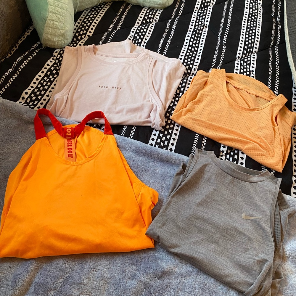 LOT OF NIKE TANK TOPS